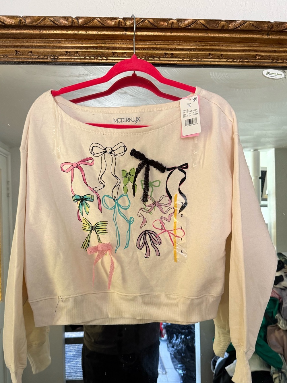 Modern Lux Cream Tee with Black and Pink Bow Appliqués